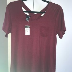 Rue 21 maroon pocket t shirt, cross back
